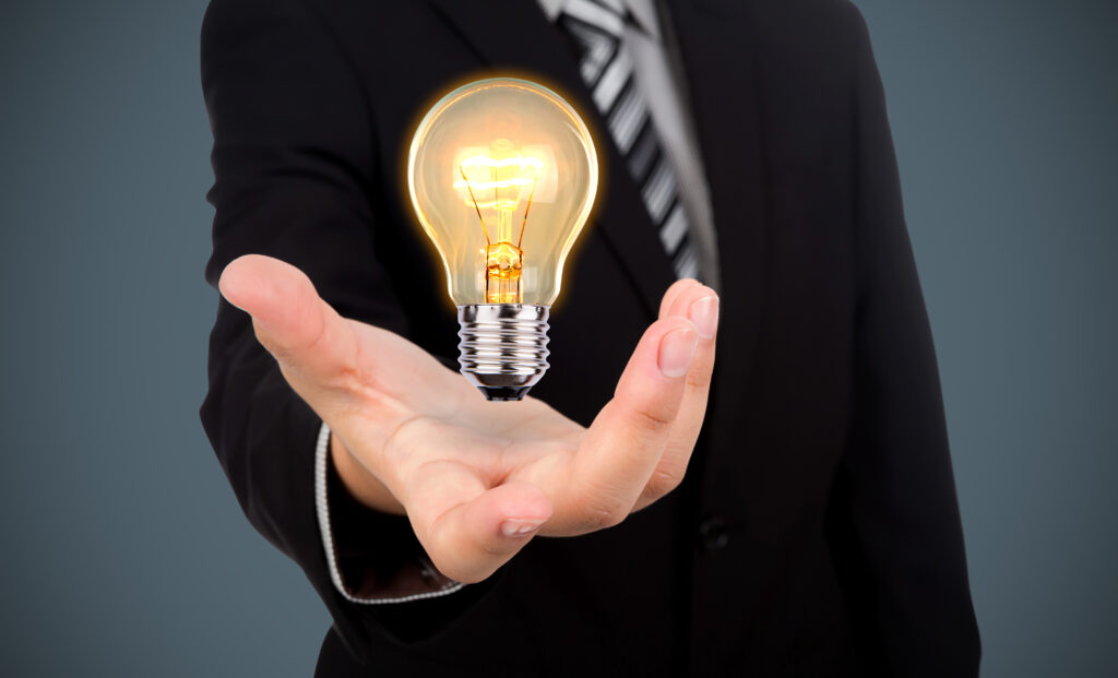 Businessman With Light Bulb His Hand